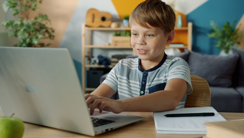 CBSE student in Kerala attending an online tuition class on a laptop at home