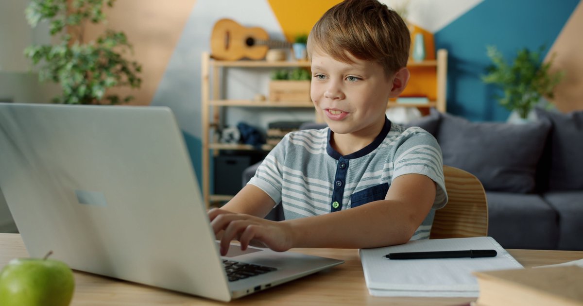 CBSE student in Kerala attending an online tuition class on a laptop at home