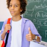 CBSE student giving a thumbs up after improving maths scores through online coaching