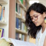 CBSE student reading a Hindi textbook as part of online Hindi tuition
