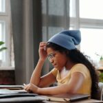 CBSE student studying at a home desk comparing online tuition to offline tuition centres